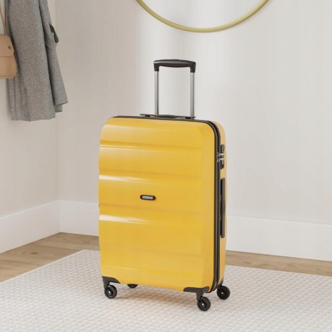 American Tourister Walizka twarda średnia żółta SPINNER 66/24 61 l